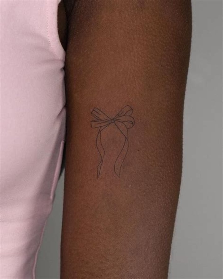 13 Coquette Tattoo Ideas Inspired By Hailey Bieber's Dainty Bow