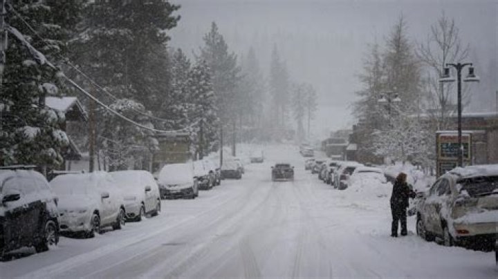 A massive blizzard howls in the Sierra Nevada. High winds and heavy snow close roads and ski resorts