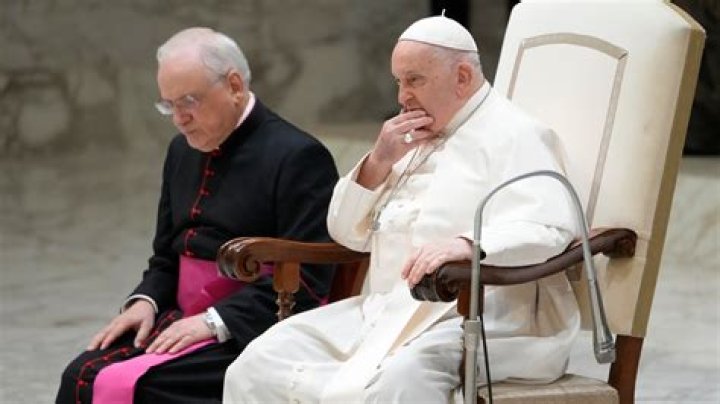 An ailing Pope Francis appears at a weekly audience but says he’s not well and has aide read speech