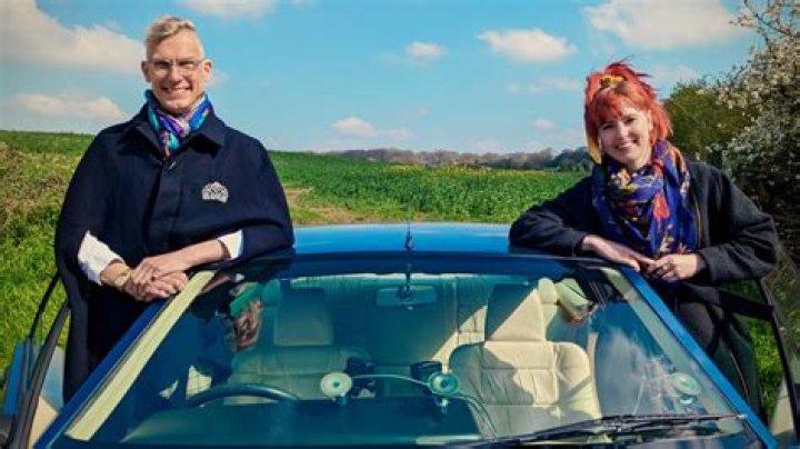 Antiques Road Trip's Izzie Balmer flashes her legs in summer dress as she enjoys a cocktail in hot weather