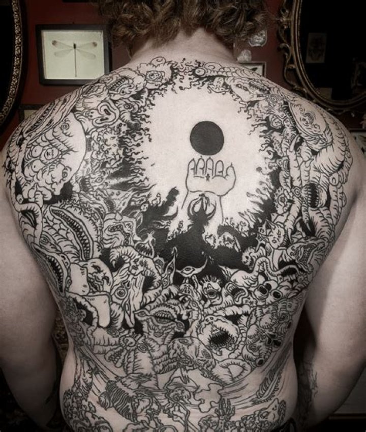 Berserk Tattoo Captures The Insane Darkness of Guts