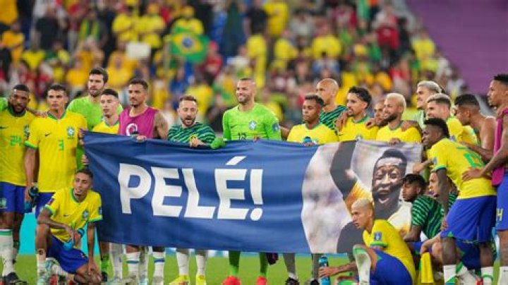 Brazil stars carry Pele poster on to pitch and pose for touching tribute as legend watches World Cup match from hospital