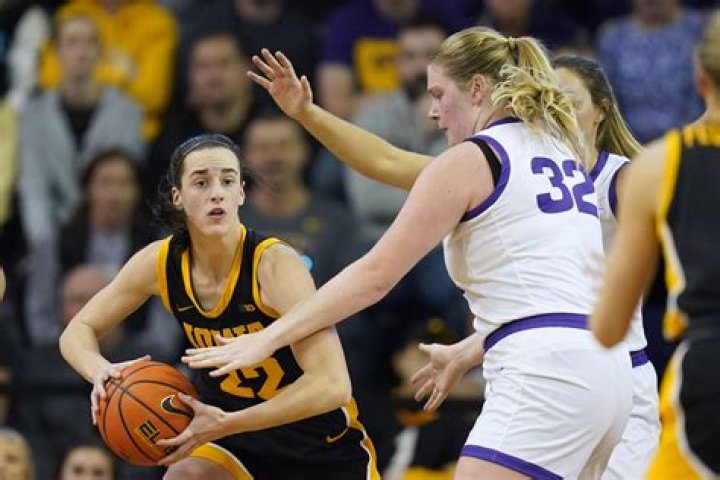 Caitlin Clark passes Megan Gustafson to become Iowa’s all-time leading scorer in Hawkeyes’ win