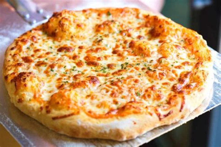 Can Swiss cheese be used on pizza?