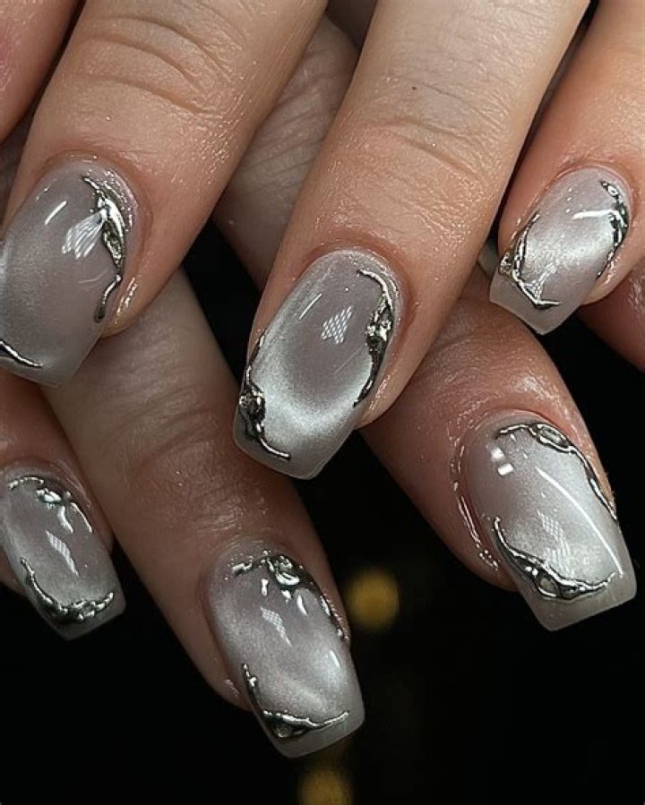 Catch Dua Lipa's Silver Chrome Nails Before They Go 