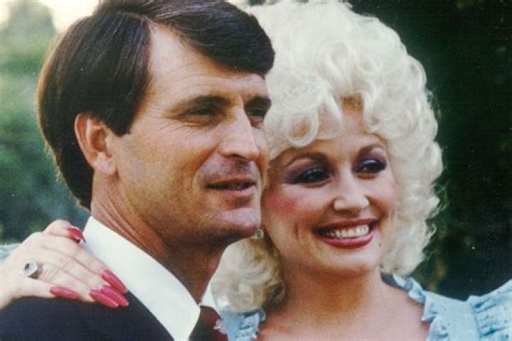 Dolly Parton Jokingly Claims Husband Carl Dean Thomas Was 'Jealous' Of Her Viral Cheerleading Outfit, Says 'He Got A Kick Out Of It'
