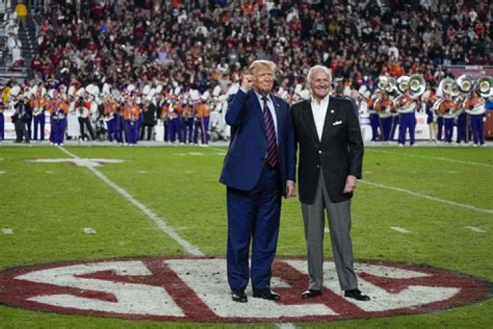 Donald Trump draws cheers, some boos in Haley’s backyard at Clemson-South Carolina football game