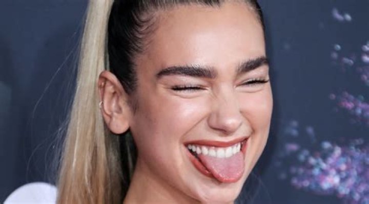Dua Lipa is happy alone following Anwar Hadid breakup