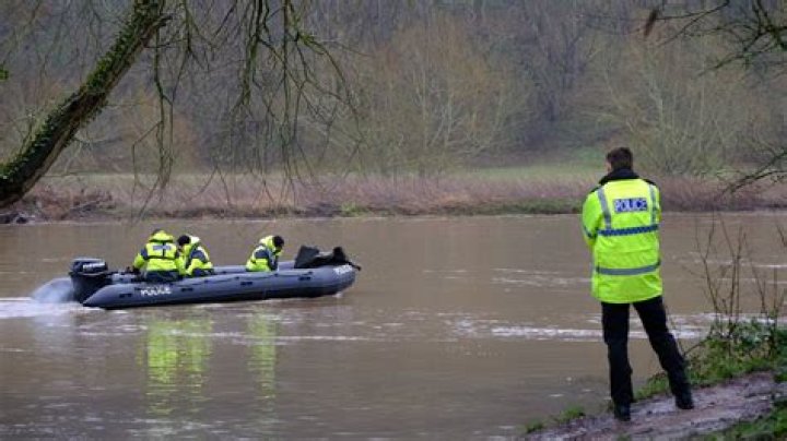 Frantic search launched for two people after their car plunged into flooded River Trent and was swept away