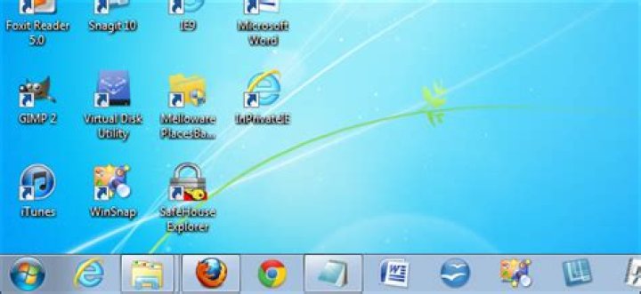 How to make more space available on the windows 7 taskbar