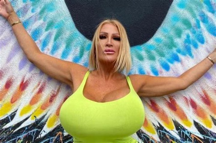 I’m a mum-of-eight with massive 54-inch boobs that weigh 20lbs - I look and feel better than ever at 54