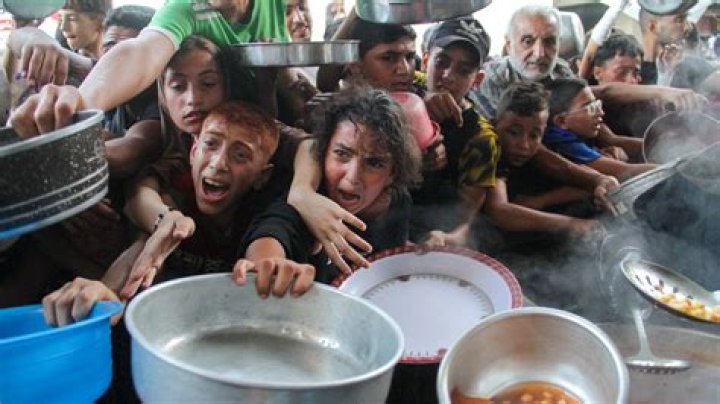 Israel is holding up food for 1.1 million Palestinians in Gaza, the main UN aid agency there says