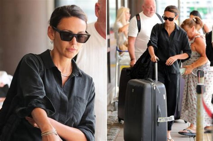 Michelle Keegan looks tense as she flies home from Spain without husband Mark Wright