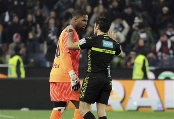 Milan keeper Maignan wants stronger action after racist abuse. FIFA president eyes tougher sanctions