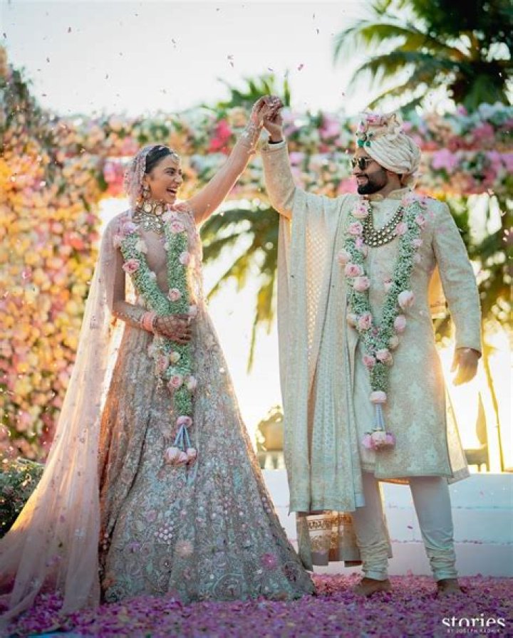New bride Rakul Preet Singh embraces traditions with pink choodha, mehendi, and sindoor in yellow ochre Anarkali suit