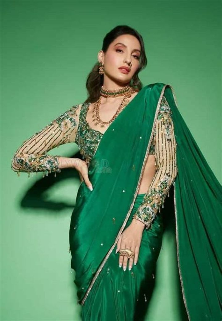 Nora Fatehi gives a green light to oversized silhouettes for winter in Gucci tweed coat worth Rs 3.84 lacs