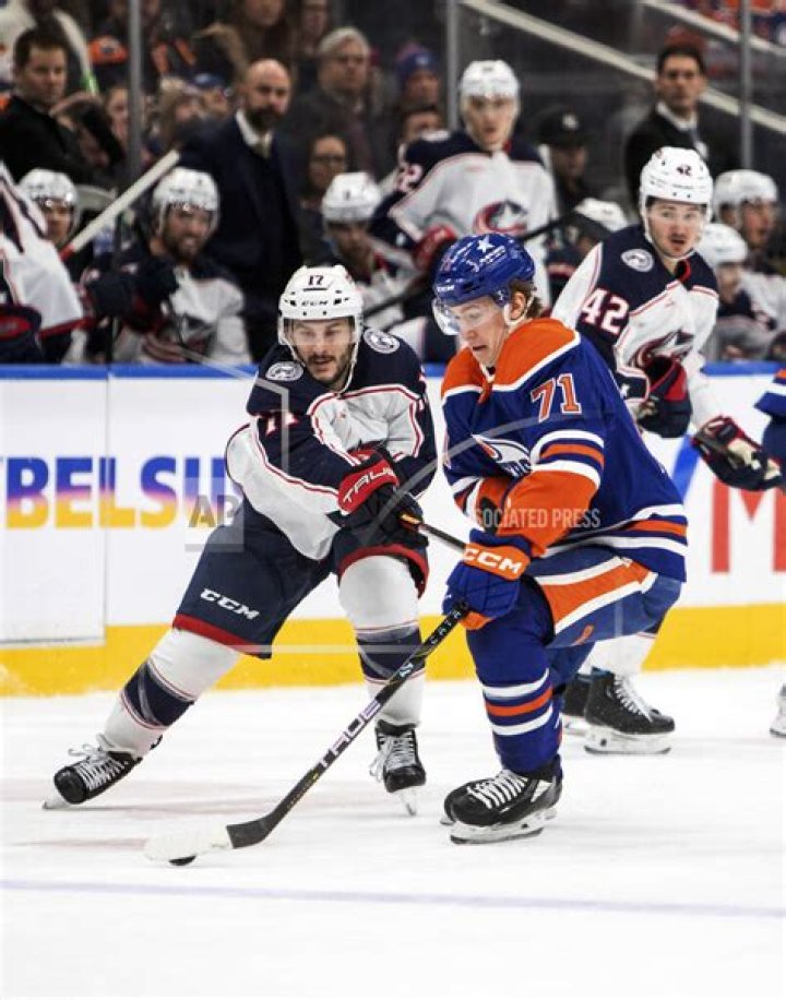 Oilers beat Blue Jackets 4-1 for 14th straight victory, close within 3 wins of the NHL record