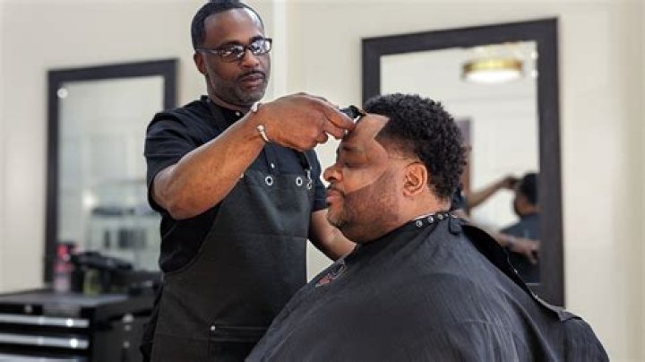 Owner of Devine Creations Barbershop says shots on Saturday did not happen at the shop