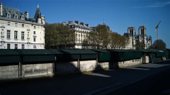 President’s intervention keeps Paris’ riverside bookstalls in place for the Olympics