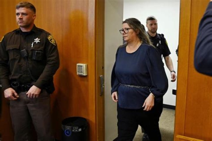 Prosecutor uses texts to try to show mom of school shooter cared more about horses than son