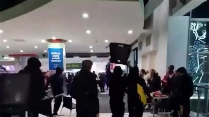Screams as Boxing Day brawl erupts in one of Britain’s busiest shopping centres with thugs seen hurling chairs