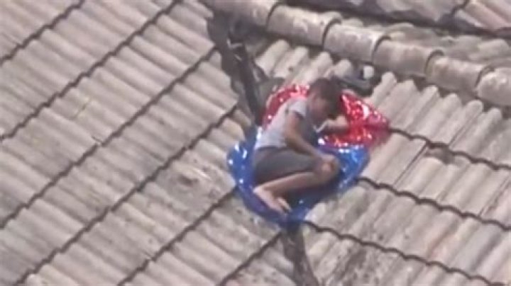 Television reporter spots missing young boy on the roof from helicopter while broadcasting news report on disappearance