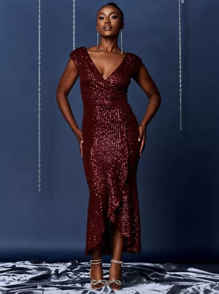Tesco is selling the ‘perfect sequin Christmas party dress’ - it’s got a cute velvet bow and is less than £30