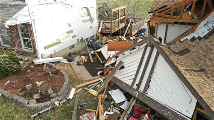 Tornado touched down at Clinton-Scott County border, damaged house