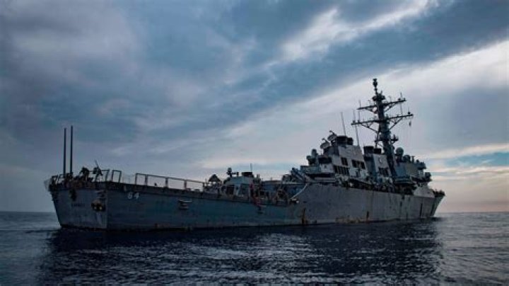 US Navy fights off barrage of 14 drones in Red Sea fired from Yemen as 'global trade problem' looms