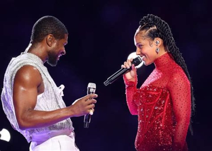 Usher Lets 21 Savage Sing 'My Boo' at Concert - Watch