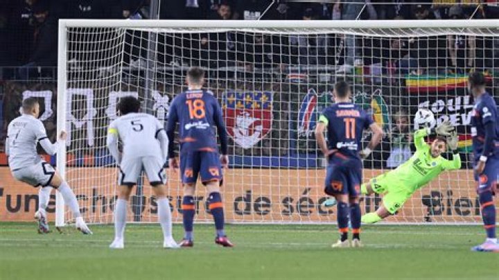 Watch as Mbappe has penalty saved then awarded retake that he crashes against post before spooning rebound over bar