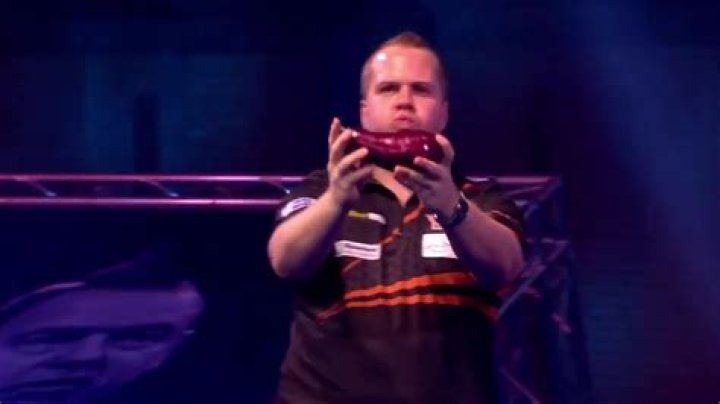 Watch Dirk van Duijvenbode’s outrageous entrance at Ally Pally as Dutch darts star presents aubergine to walk on girls