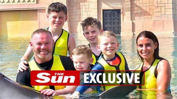 Wayne Rooney slammed for swimming with captive dolphins on Dubai summer holiday