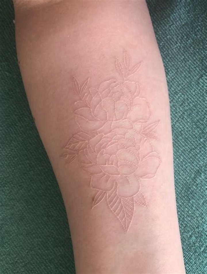 White Ink Tattoos On Tan Skin Could End In Total Tragedy, So Slather On That SPF