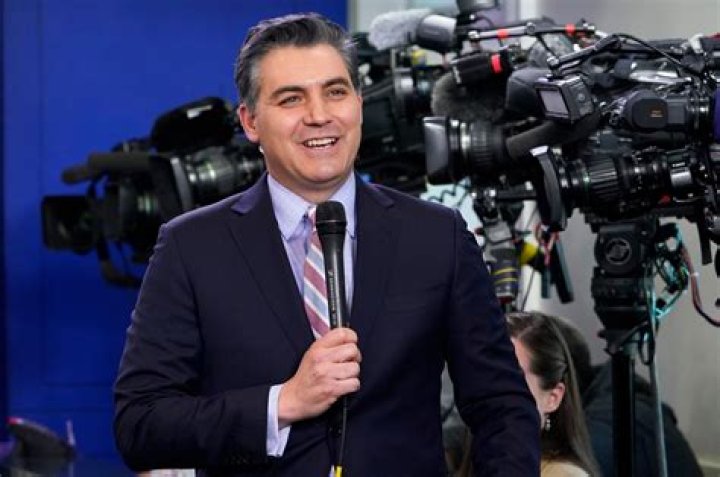 Who is Jim Acosta and what is his net worth?
