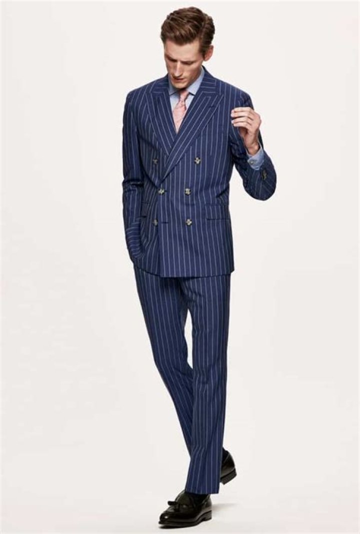 Why You Should Own A Pinstripe Suit (And How To Wear It)